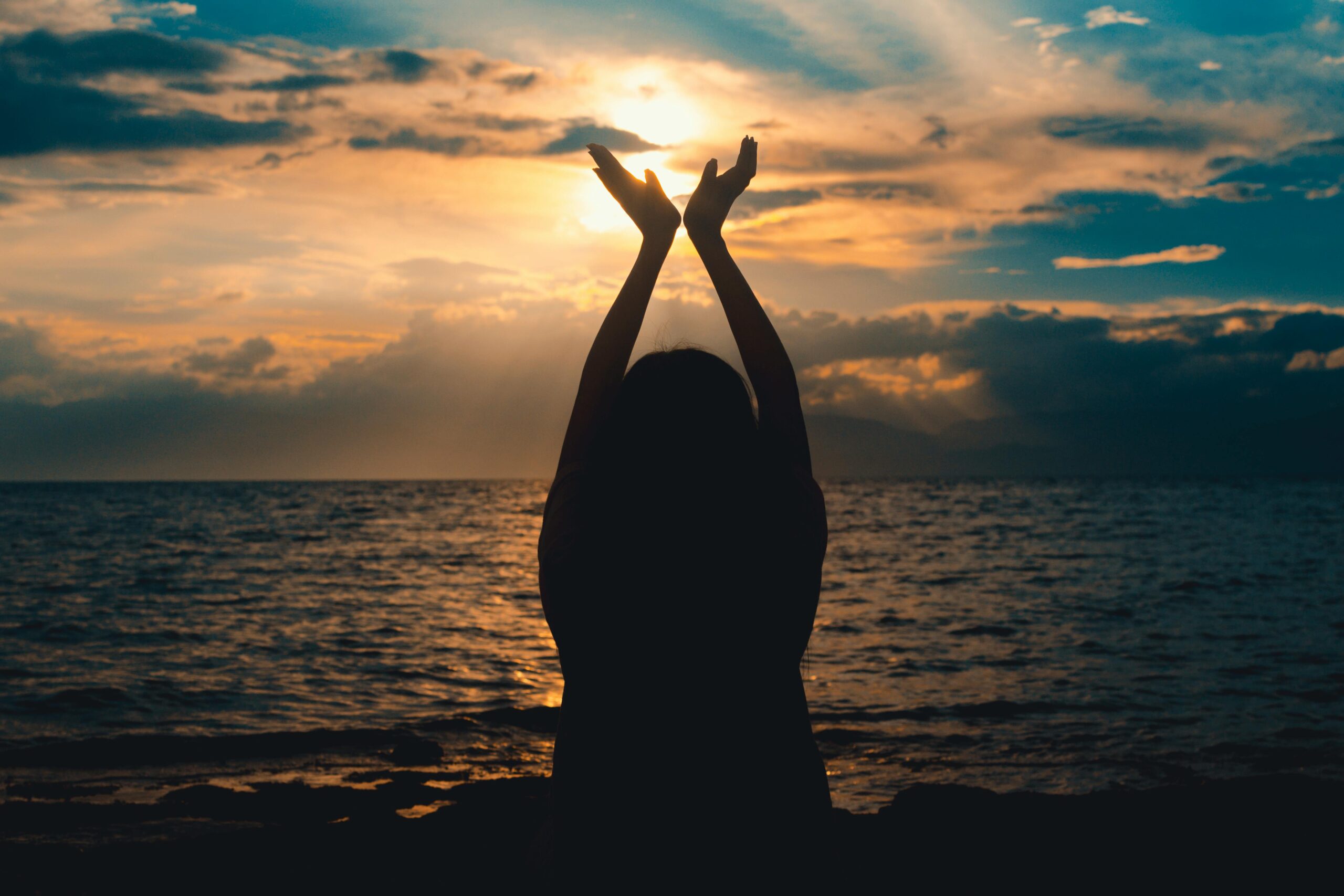 “Woman manifesting with ease and flow through alignment with The Divine Source.”